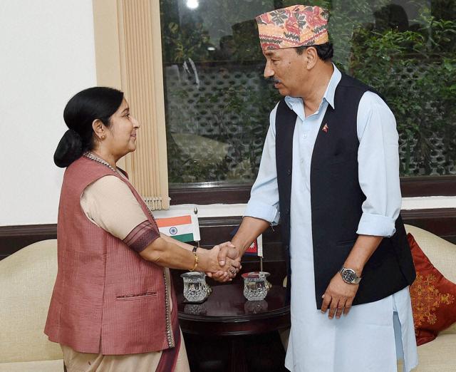 Foreign minister Sushama Swaraj greets Nepal's deputy Prime Minster and foreign minister Kamal Thapa in New Delhi on Friday.(PTI)