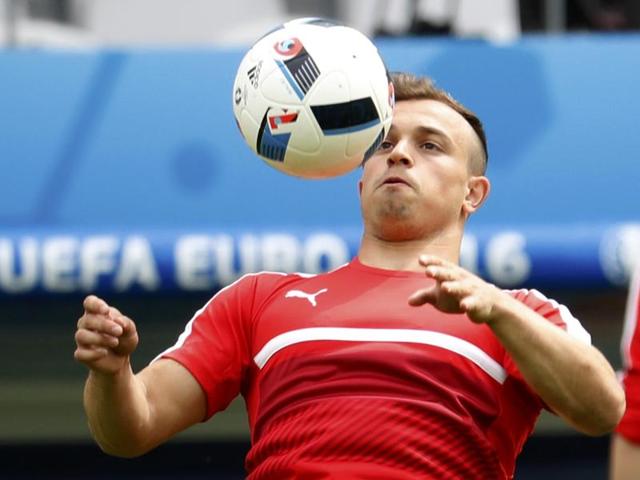 A combination of two file pictures shows Switzerland's Xherdan Shaqiri, left, and Albania's midfielder Lorik Cana. Switzerland face Albania in their first Euro 2016 group A match in Lens on June 11, 2016. (AFP) A combination of two file pictures shows Switzerland's Xherdan Shaqiri, left, and Albania's midfielder Lorik Cana. Switzerland face Albania in their first Euro 2016 group A match in Lens on June 11, 2016. (AFP)