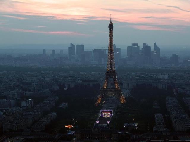 This picture taken on June 9, 2016 from the Montparnasse tower shows the opening concert of the Paris fan zone on the Champs de Mars one day before the start of the Euro 2016 football championship, in Paris. (AFP)