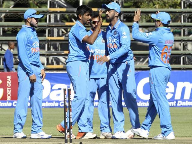 Indian cricket players celebrate the wicket of Zimbabwean batsman Chamunorwa Chibhabha during the One Day International cricket match. (AP Photo) Indian cricket players celebrate the wicket of Zimbabwean batsman Chamunorwa Chibhabha during the One Day International cricket match. (AP Photo)