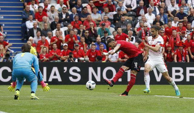 Albania's Armando Sadiku shoots at goal against Switzerland. (Reuters Photo) Albania's Armando Sadiku shoots at goal against Switzerland. (Reuters Photo)