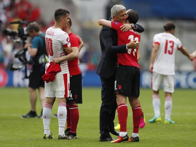 Aside from this post-match embrace, the brothers hugged it out at the start of the match as well. (REUTERS) Aside from this post-match embrace, the brothers hugged it out at the start of the match as well. (REUTERS)