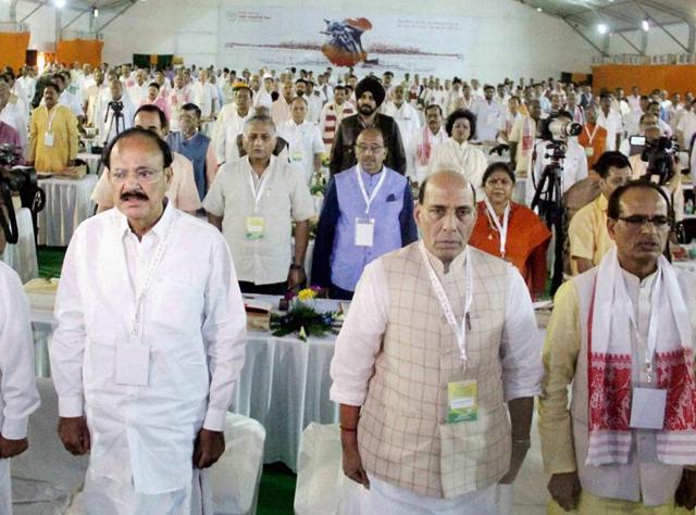 Home minister Rajnath Singh, parliamentary affairs minister M Venkaiah Naidu, Madhya Pradesh CM Shivraj Singh Chouhan at the party's national executive meet in Allahabad on Sunday. (PTI) Home minister Rajnath Singh, parliamentary affairs minister M Venkaiah Naidu, Madhya Pradesh CM Shivraj Singh Chouhan at the party's national executive meet in Allahabad on Sunday. (PTI)