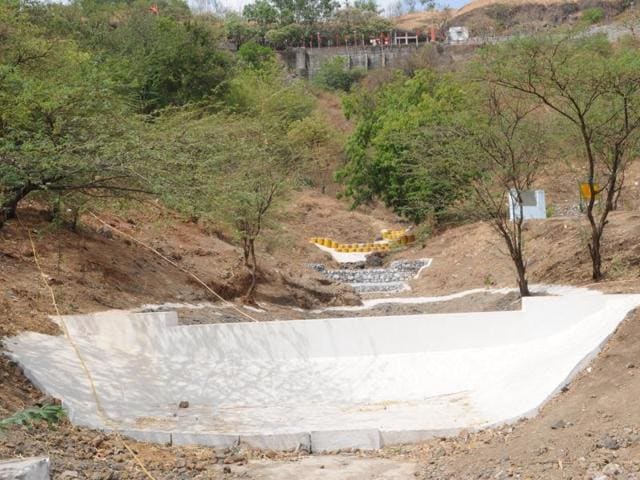 Boulder checks have been put in place to stop soil erosion at the hillock in Dewas. (Praveen Bajpai/HT photo) Boulder checks have been put in place to stop soil erosion at the hillock in Dewas. (Praveen Bajpai/HT photo)