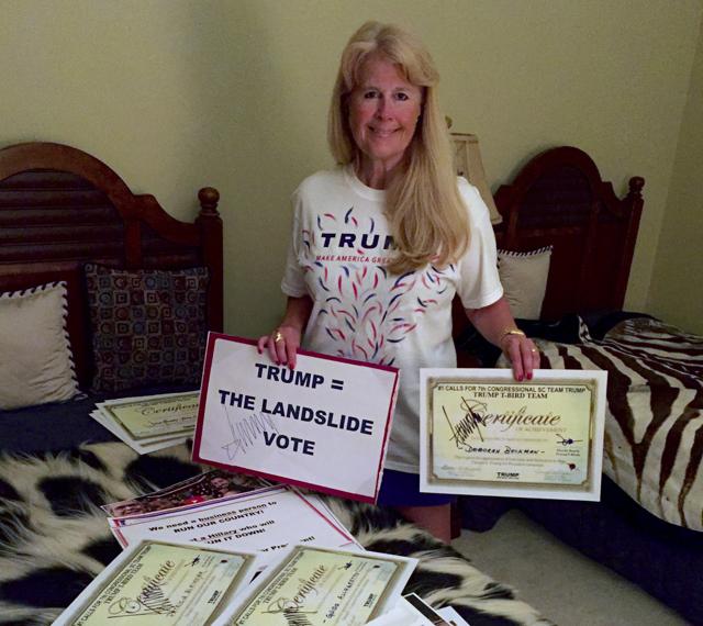 Dale "Boomer" Ranney shows items that Republican presidential candidate Donald Trump has autographed, at her home in Myrtle Beach, S.C. Trump is finding dedicated volunteers for his presidential campaign among his fan base.(AP)