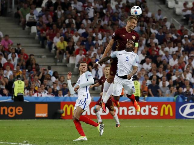 Vasili Berezutski heads in Russia’s late equaliser. (REUTERS) Vasili Berezutski heads in Russia’s late equaliser. (REUTERS)
