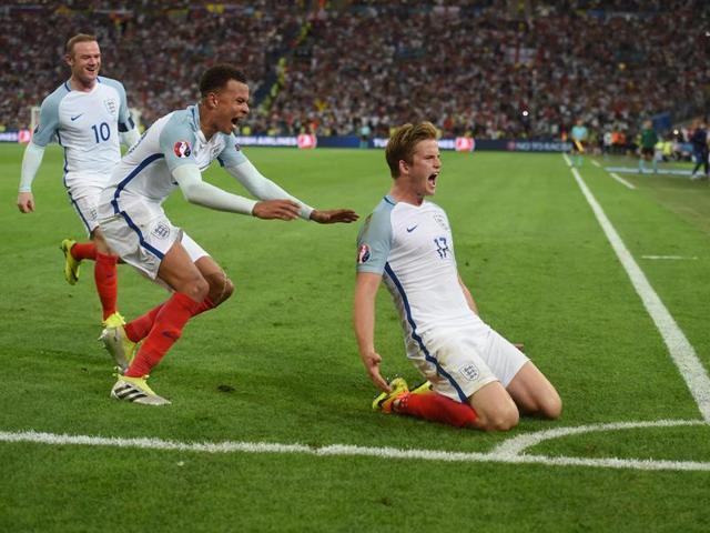 England's midfielder Eric Dier (R) celebrates after scoring England's goal. (AFP) England's midfielder Eric Dier (R) celebrates after scoring England's goal. (AFP)