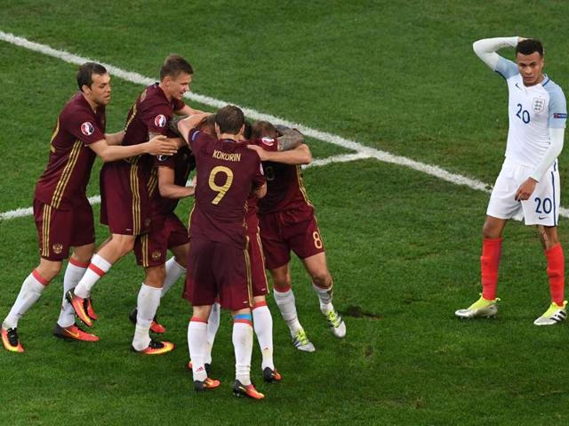 Russia's defender Vasily Berezutskiy (hidden) is congratulated by teammates after scoring a late equaliser for a 1-1 draw in the Euro 2016 group B match against England at the Stade Velodrome in Marseille on June 11, 2016. (AFP) Russia's defender Vasily Berezutskiy (hidden) is congratulated by teammates after scoring a late equaliser for a 1-1 draw in the Euro 2016 group B match against England at the Stade Velodrome in Marseille on June 11, 2016. (AFP)