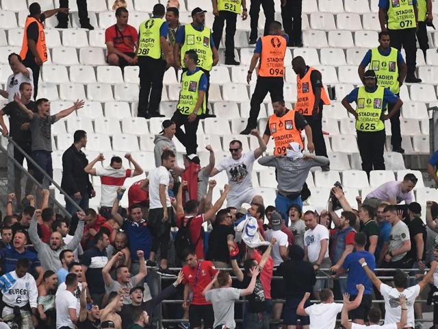 Russian supporters chant slogans during the match. (AFP) Russian supporters chant slogans during the match. (AFP)