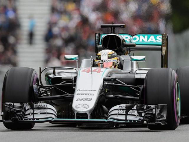 Mercedes driver Lewis Hamilton (44) of Great Britain comes through the Senna corner. (AP Photo) Mercedes driver Lewis Hamilton (44) of Great Britain comes through the Senna corner. (AP Photo)