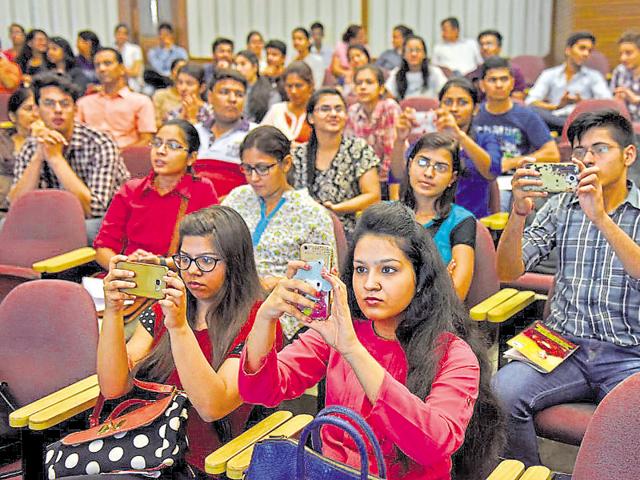 Students and parents at an ‘Open Day’ in South Campus on Friday.(Sushil Kumar/HT File)