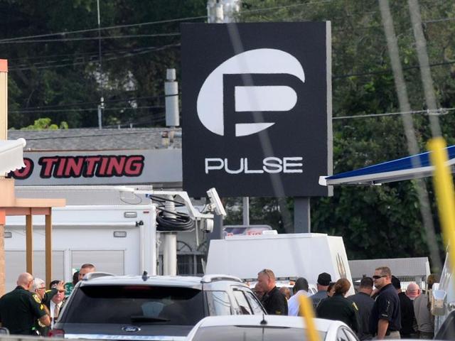 Orlando police officers seen outside of Pulse nightclub after a fatal shooting in Orlando, Florida.(AFP Photo)