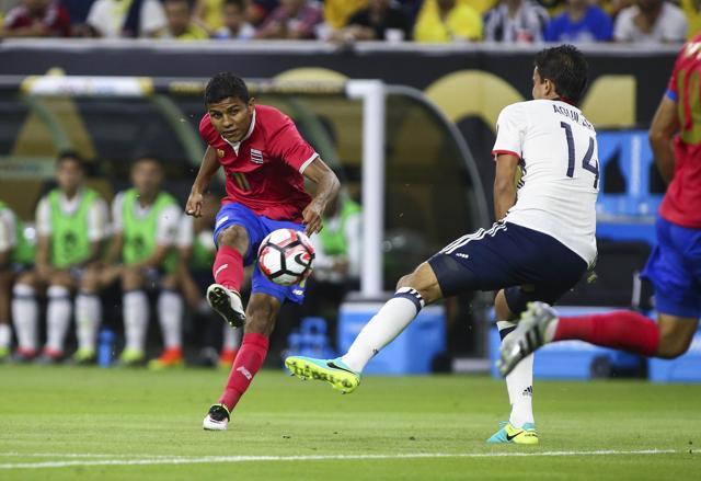 Johan Venegas (11) scores with a 20-yard strike. (Reuters) Johan Venegas (11) scores with a 20-yard strike. (Reuters)