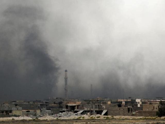 Smoke billows from Fallujah's southern Shuhada neighbourhood following shelling during an operation by Iraqi government forces. (AFP Photo) Smoke billows from Fallujah's southern Shuhada neighbourhood following shelling during an operation by Iraqi government forces. (AFP Photo)