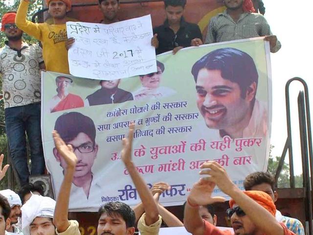 A group of Bharatiya Janata Party youth activists stop Vibhuti Express Train near Rambagh Railway Station in Allahabad on Tuesday during a protest demanding announcement of Varun Gandhi as Uttar Pradesh chief ministerial candidate.(PTI file photo)