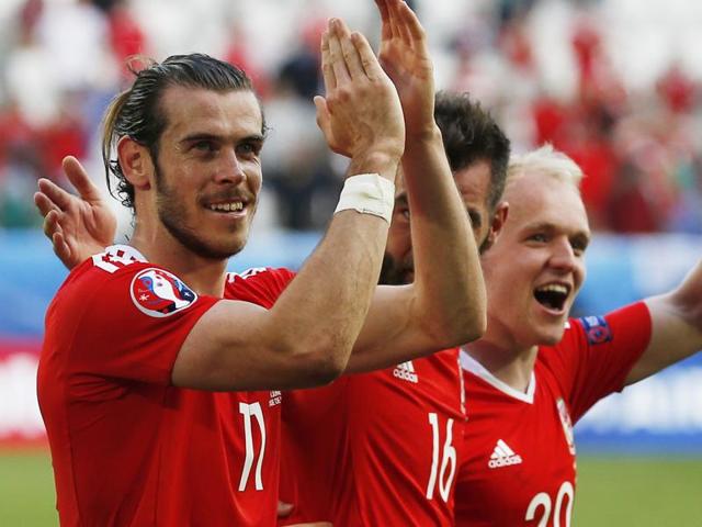 Wales' Gareth Bale celebrates after Wales' Hal Robson-Kanu scores their second goal. (Reuters Photo) Wales' Gareth Bale celebrates after Wales' Hal Robson-Kanu scores their second goal. (Reuters Photo)