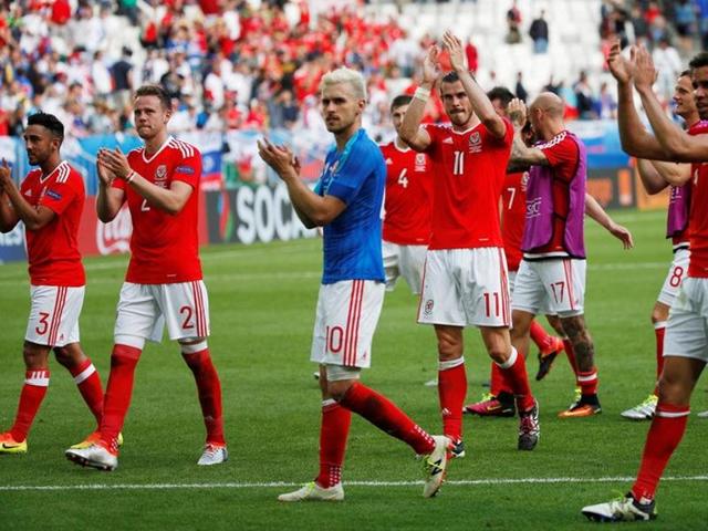 Wales' Aaron Ramsey (C) and Gareth Bale (2nd R) celebrate at the end of their 2-1 win over Slovakia at the Stade de Bordeaux on June 11, 2016. (Reuters) Wales' Aaron Ramsey (C) and Gareth Bale (2nd R) celebrate at the end of their 2-1 win over Slovakia at the Stade de Bordeaux on June 11, 2016. (Reuters)