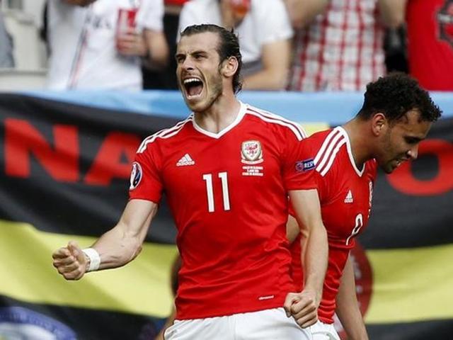 Gareth Bale celebrates after teammate Hal Robson-Kanu scores Wales’ second goal. (Reuters) Gareth Bale celebrates after teammate Hal Robson-Kanu scores Wales’ second goal. (Reuters)