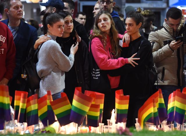 Australians gather to place candles and flags in Sydney on June 13, 2016, in solidarity with the global gay community after a gunman opened fire in a nightclub in Orlando, Florida, killing over 50 people. (AFP Photo) Australians gather to place candles and flags in Sydney on June 13, 2016, in solidarity with the global gay community after a gunman opened fire in a nightclub in Orlando, Florida, killing over 50 people. (AFP Photo)