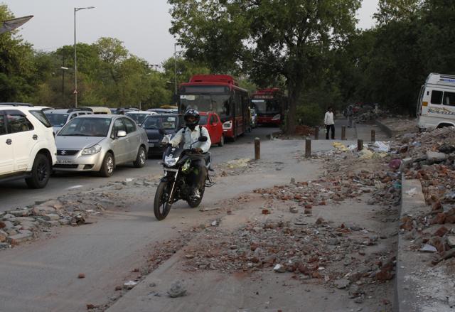 The uneven patches are risky, especially for two-wheeler riders. (Sanchit Khanna / HT Photos)