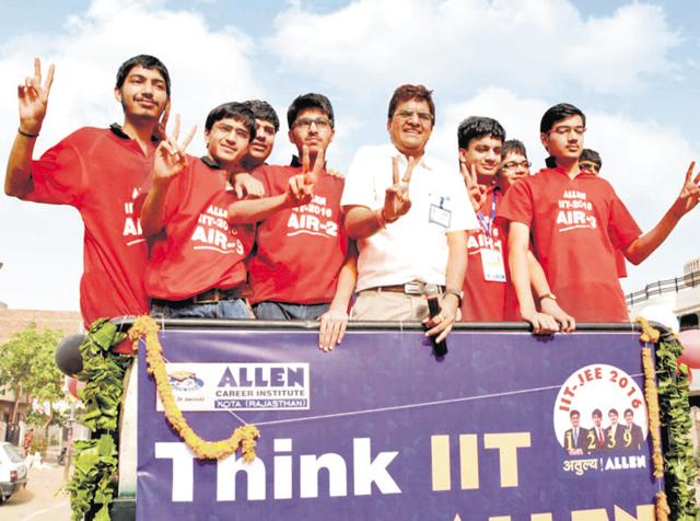 JEE Advanced, 2016 topper Aman Bansal along with other top scorers from Kota’s Allen Career Institute during a success rally in Kota on Monday.(AH Zaidi/HT Photo)