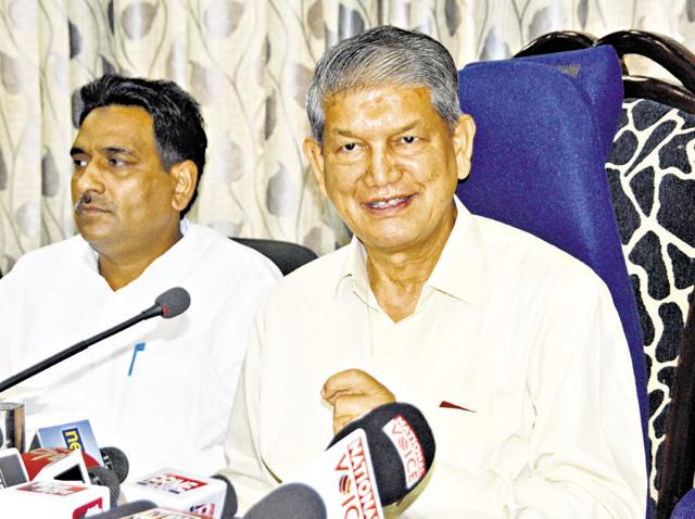 Rawat said he was forced to reach out to the people after knocking on the Centre’s doors to ratify the budgetary provisions passed by the state legislature.(HT Photo)