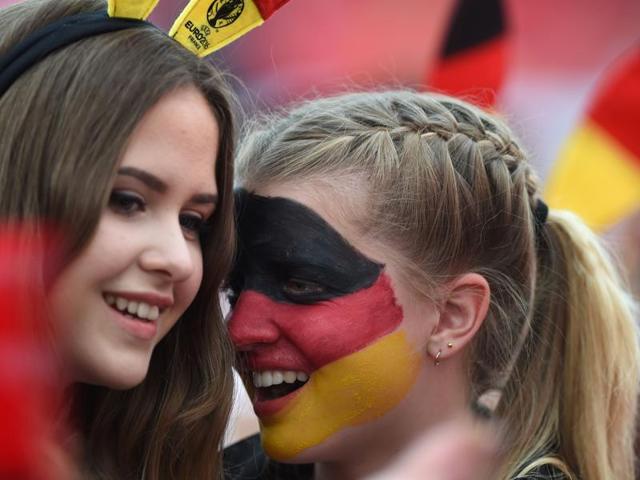 Gerrman supporters speak together during a public viewing for the first Euro 2016 match of the German team. (AFP Photo) Gerrman supporters speak together during a public viewing for the first Euro 2016 match of the German team. (AFP Photo)