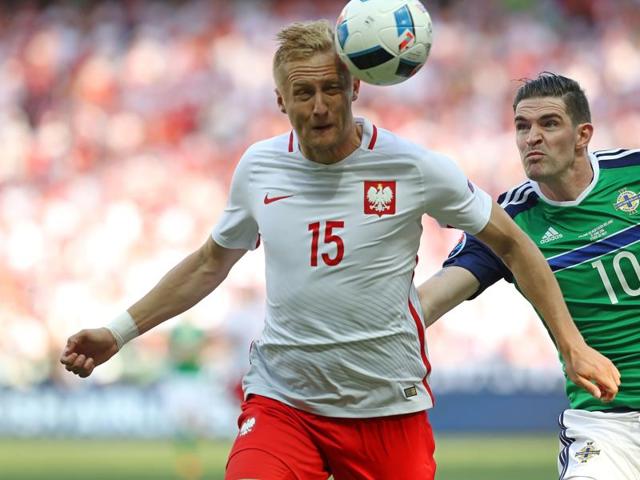 Poland's defender Kamil Glik (L) vies for the ball with Northern Ireland's forward Kyle Lafferty. (AFP Photo) Poland's defender Kamil Glik (L) vies for the ball with Northern Ireland's forward Kyle Lafferty. (AFP Photo)