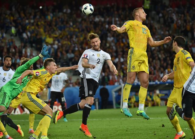Germany's goalkeeper Manuel Neuer (left) and Germany's defender Shkodran Mustafi (centre) try to block a shot on goal by Ukraine's defender Vyacheslav Shevchuk (right) during the Euro 2016 group C football match at the Stade Pierre Mauroy, near Lille. (AFP Photo) Germany's goalkeeper Manuel Neuer (left) and Germany's defender Shkodran Mustafi (centre) try to block a shot on goal by Ukraine's defender Vyacheslav Shevchuk (right) during the Euro 2016 group C football match at the Stade Pierre Mauroy, near Lille. (AFP Photo)
