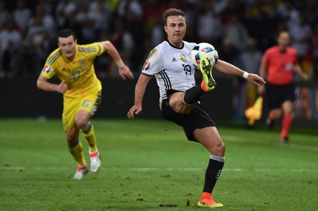 Germany forward Mario Goetze controls the ball during the Euro Group C match against Ukraine. (AFP Photo)