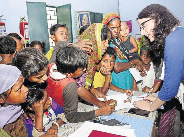 Around 32 children from ragpickers’ families, who were being schooled by Arpna Chandail at a makeshift school, were admitted to a government primary school in Ghaziabad on Monday. (Sakib Ali /HT) Around 32 children from ragpickers’ families, who were being schooled by Arpna Chandail at a makeshift school, were admitted to a government primary school in Ghaziabad on Monday. (Sakib Ali /HT)