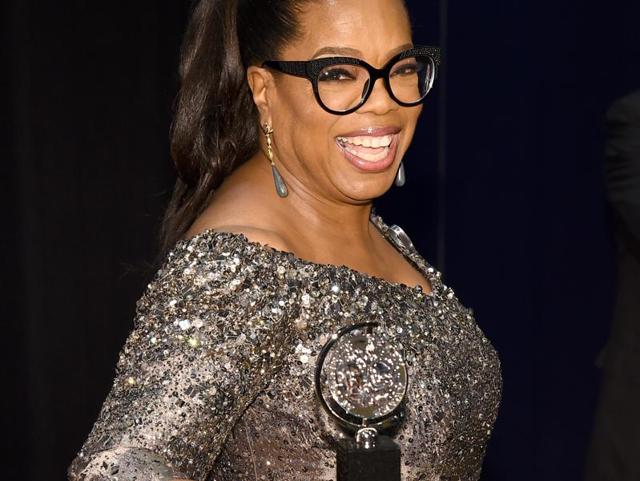 Oprah Winfrey poses with the award for best revival of a musical for “The Color Purple” the press room at the Tony Awards on Sunday. (Charles Sykes/Invision/AP) Oprah Winfrey poses with the award for best revival of a musical for “The Color Purple” the press room at the Tony Awards on Sunday. (Charles Sykes/Invision/AP)