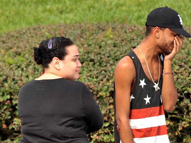 Friends and family members embrace outside the Orlando Police Headquarters during the investigation of a shooting at the Pulse nightclub. (REUTERS) Friends and family members embrace outside the Orlando Police Headquarters during the investigation of a shooting at the Pulse nightclub. (REUTERS)