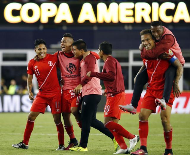 Peru forward Raul Ruidiaz (11) is mobbed by teammates after their 1-0 win over Brazil in the group play stage of the 2016 Copa America Centenario, at Gillette Stadium. (Reuters via USA Today Sports) Peru forward Raul Ruidiaz (11) is mobbed by teammates after their 1-0 win over Brazil in the group play stage of the 2016 Copa America Centenario, at Gillette Stadium. (Reuters via USA Today Sports)