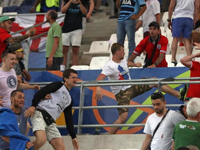 Russian supporters attack England fans at the end of the Euro 2016 Group B football match between England and Russia, at the Velodrome stadium in Marseille, France.(AP Photo)