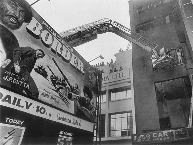 This file photo taken on June 13, 1997, shows the rescue operation in full swing at Uphaar cinema hall. (PTI File Photo)
