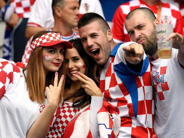 Croatia fans pose for pictures ahead of the start of the Euro 2016 group D football match between Turkey and Croatia at the Parc des Princes in Paris. (AFP Photo) Croatia fans pose for pictures ahead of the start of the Euro 2016 group D football match between Turkey and Croatia at the Parc des Princes in Paris. (AFP Photo)