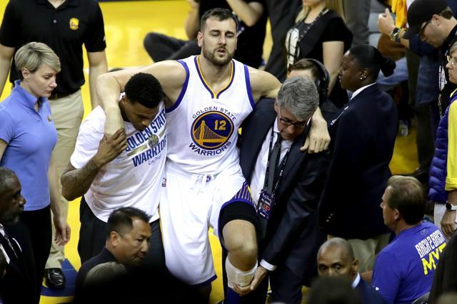 Golden State Warriors Andrew Bogut sustained an injury during the third quarter against the Cleveland Cavaliers on Tuesday. (AFP Photo) Golden State Warriors Andrew Bogut sustained an injury during the third quarter against the Cleveland Cavaliers on Tuesday. (AFP Photo)