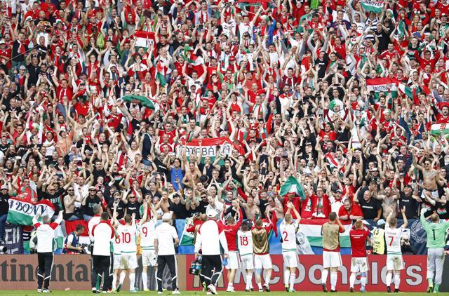 Hungary players celebrate with fans after the game. (Reuters Photo) Hungary players celebrate with fans after the game. (Reuters Photo)