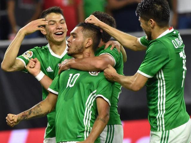 Mexico's Jesus Manuel Corona celebrates with teammates after scoring against Venezuela. (AFP Photo) Mexico's Jesus Manuel Corona celebrates with teammates after scoring against Venezuela. (AFP Photo)