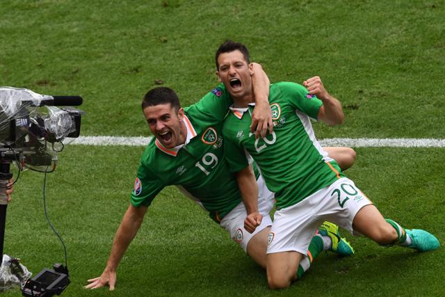 Ireland's midfielder Wesley Hoolahan (R) celebrates his goal with teammate Robert Brady. (AFP)