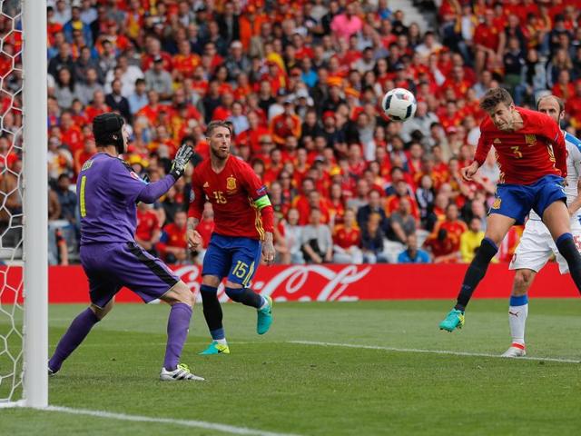 Pique heads in the winner past Czech ‘keeper Petr Cech in the 87th minute. (AP)