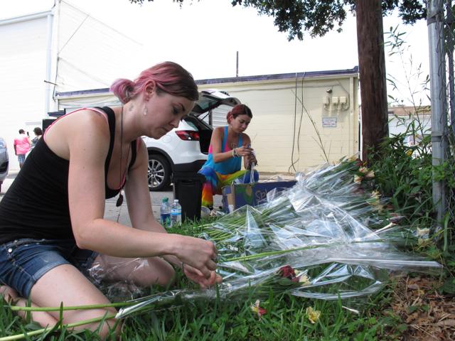 Afton McCall and Elizabeth Jennings wrap flowers for the grieving outside the GLBT Center for Central Florida in Orlando, Florida on Monday, June 13, 2016. (AP Photo) Afton McCall and Elizabeth Jennings wrap flowers for the grieving outside the GLBT Center for Central Florida in Orlando, Florida on Monday, June 13, 2016. (AP Photo)