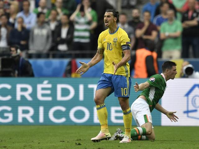 Sweden's Zlatan Ibrahimovic, left, and Ireland's Ciaran Clark engaged in a tussle. (AP)