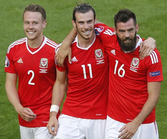 Wales' Chris Gunter, Gareth Bale and Joe Ledley celebrate after the match. (Reuters Photo) Wales' Chris Gunter, Gareth Bale and Joe Ledley celebrate after the match. (Reuters Photo)