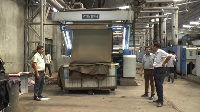 Titan Process House has received white cloth from weaving units in the textile town of Bhilwara with orders to dye it a dark khaki. (HT Photo)