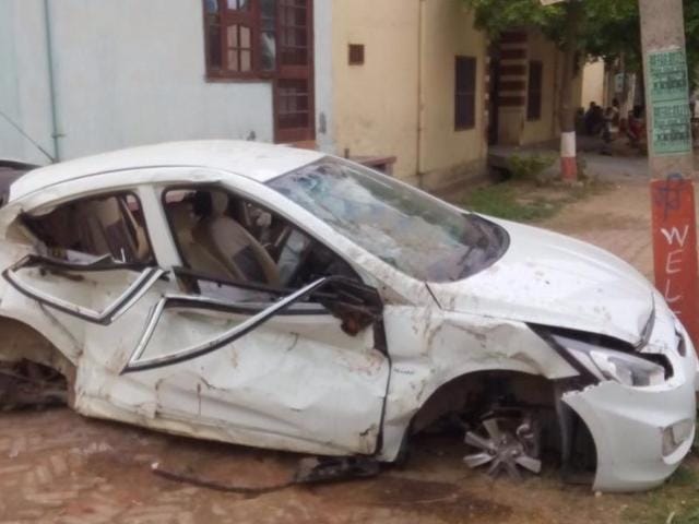 The car overturned after taking several jumps after the collision. (HT Photo) The car overturned after taking several jumps after the collision. (HT Photo)