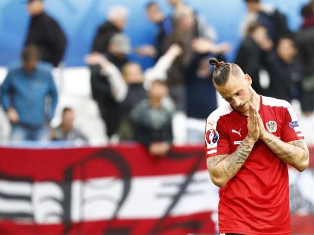 Austria's Marko Arnautovic looks dejected at the end of the match after they were defeated 2- 0 by Hungary. (Reuters Photo) Austria's Marko Arnautovic looks dejected at the end of the match after they were defeated 2- 0 by Hungary. (Reuters Photo)