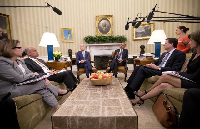 President Barack Obama, centre, speaks to members of the media in the Oval Office of the White House in Washington on Monday. With Obama are (left to right), Lisa Monaco, assistant to the president for Homeland Security and Counterterrorism, DHS secretary Jeh Johnson, vice-president Joe Biden, FBI director James Comey, and US deputy attorney general Sally Q Yates. (AP) President Barack Obama, centre, speaks to members of the media in the Oval Office of the White House in Washington on Monday. With Obama are (left to right), Lisa Monaco, assistant to the president for Homeland Security and Counterterrorism, DHS secretary Jeh Johnson, vice-president Joe Biden, FBI director James Comey, and US deputy attorney general Sally Q Yates. (AP)