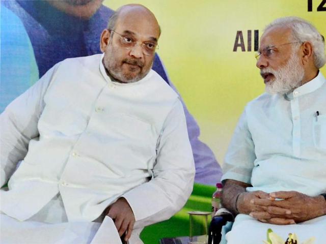 Prime Minister Narendra Modi and BJP's national president Amit Shah during the party's national executive meet in Allahabad on Sunday.(PTI)